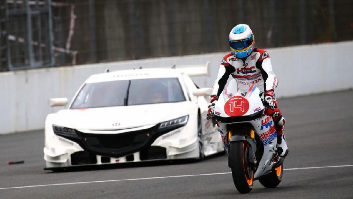 Fernando Alonso rides MotoGP Honda