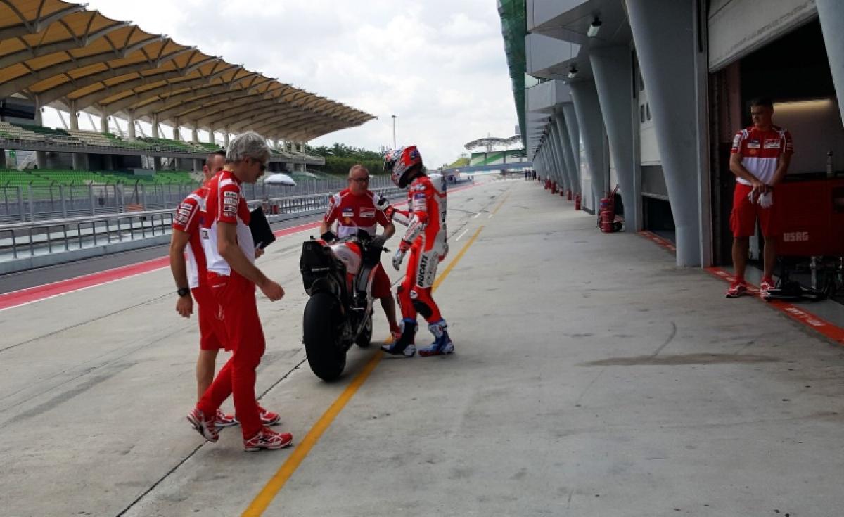Wheel covers, wings on final day at Sepang
