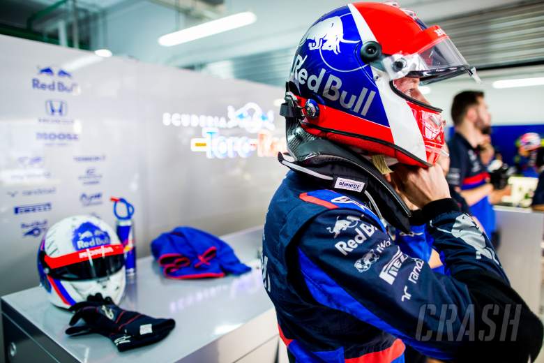 FIA to review helmet design rule after driver backlash