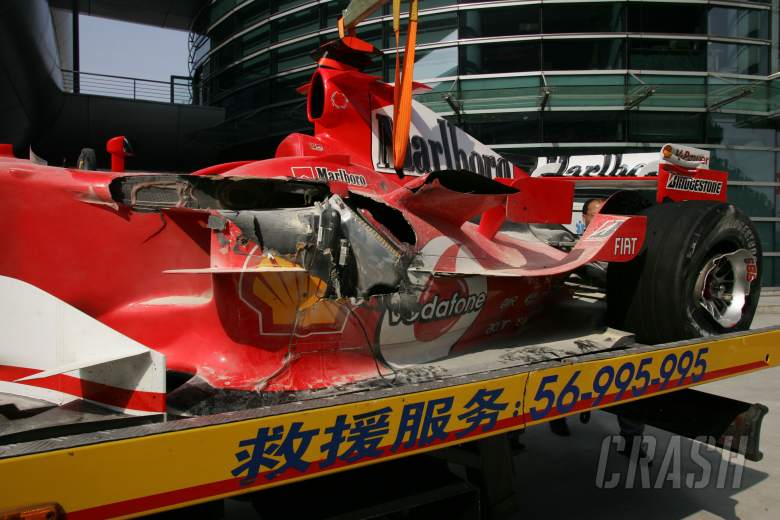 The remains of Michael Schumacher`s Ferrari after he clashed with Christijan Albers` Minardi on the 