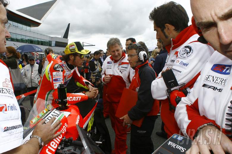Rossi, Burgess and Bridgestone technician, British MotoGP 2012