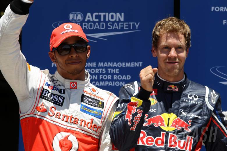 23.06.2012- Qualifying, Sebastian Vettel (GER) Red Bull Racing RB8 pole position and Lewis Hamilton