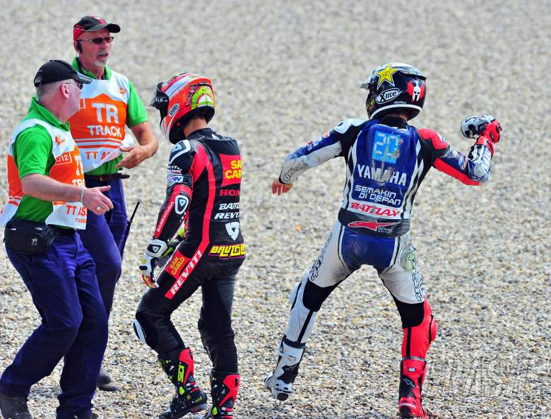 Barbera and Lorenzo after crash, Dutch MotoGP 2012