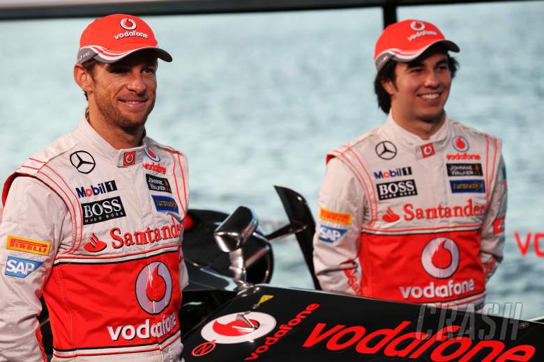 (L to R): Jenson Button (GBR) McLaren with team mate Sergio Perez (MEX) McLaren.31.01.2013. McLaren