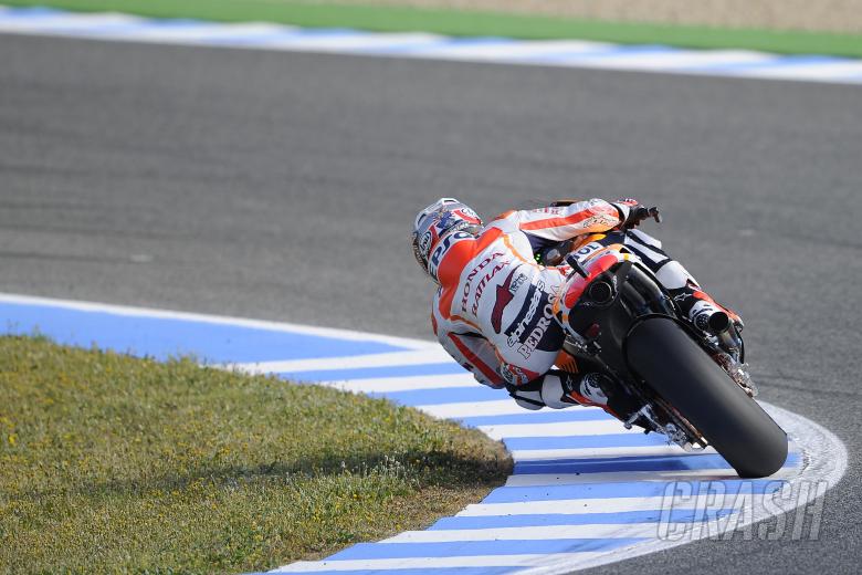 Pedrosa, using the curb on the exit of the last turn, Spanish MotoGP 2013