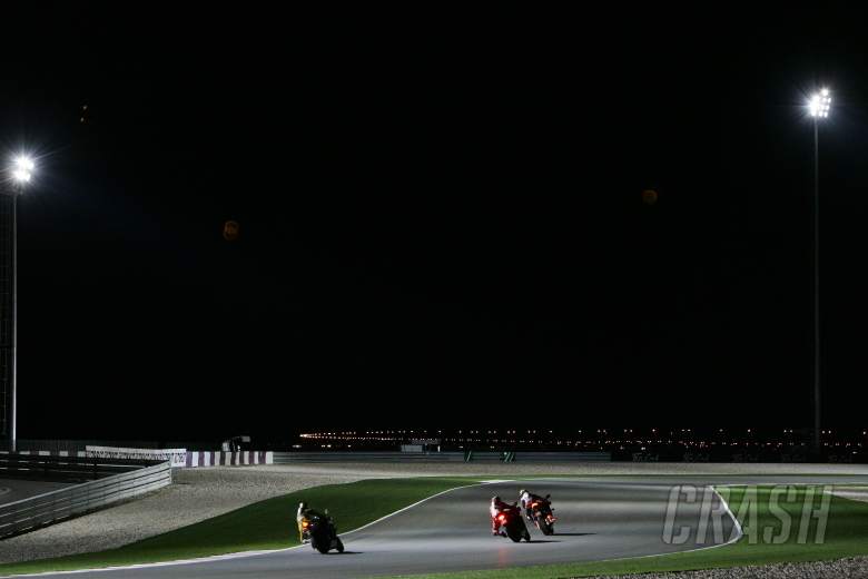 Capirossi, Roberts and Rossi try riding at night, Qatar MotoGP 2006