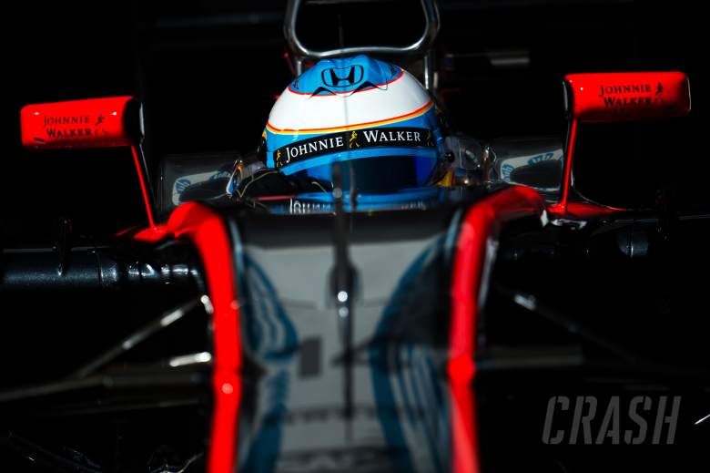 McLaren blames wind for Alonso crash, slams electrocution rumours