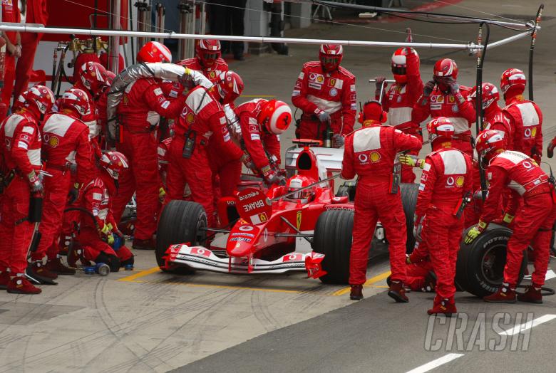 Michael Schumacher during a pit stop at the British GP