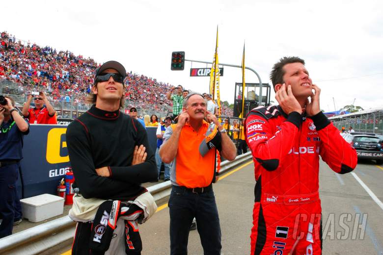 Rick Kelly (L) his dad and team owner (John Kelly (C) and Garth Tander (R) former team mate watch th
