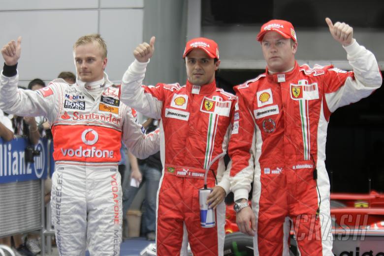 Heikki Kovalainen (FIN) McLaren MP4-23, Felipe Massa (BRA) Ferrari F2008, Kimi Raikkonen (FIN) Ferra