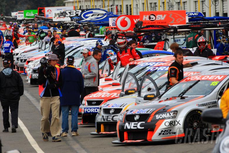 Garth Tander (aust) Toll HRT Commodore climb into his car on the pre grid in pit laneV8 Supercars Rd