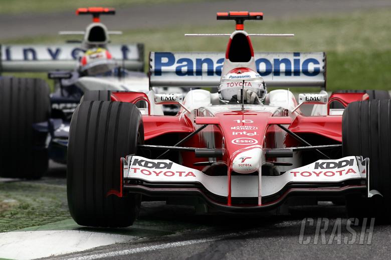 Jarno Trulli leads Mark Webber