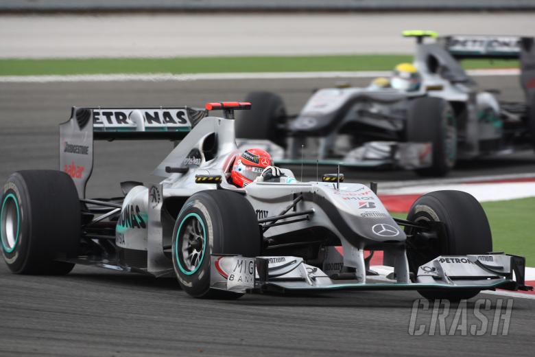 Race, Michael Schumacher (GER), Mercedes GP F1 Team, MGP W01 leads Nico Rosberg (GER), Mercedes GP