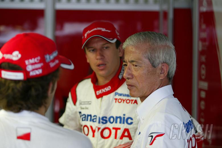 Cristiano da Matta and Olivier Panis talk with Toyota`s vice president