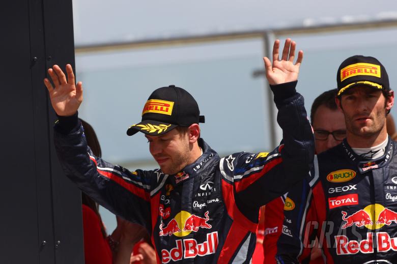 10.07.2011- Race, Sebastian Vettel (GER), Red Bull Racing, RB7 2nd position and Mark Webber (AUS), R
