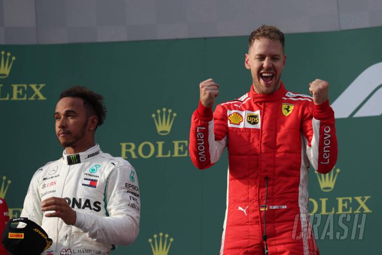 Vettel takes Australian GP win after jumping Hamilton