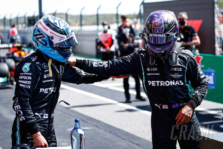 (L to R): Valtteri Bottas (FIN) Mercedes AMG F1 celebrates his pole position in qualifying parc ferme with second placed team mate Lewis Hamilton (GBR) Mercedes AMG F1.