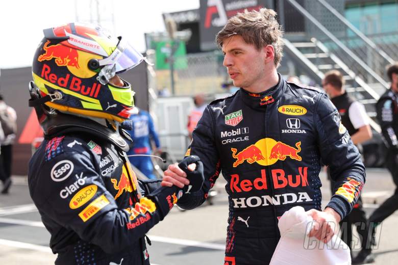 Sergio Perez (MEX) Red Bull Racing RB16B and Max Verstappen (NLD) Red Bull Racing RB16B.