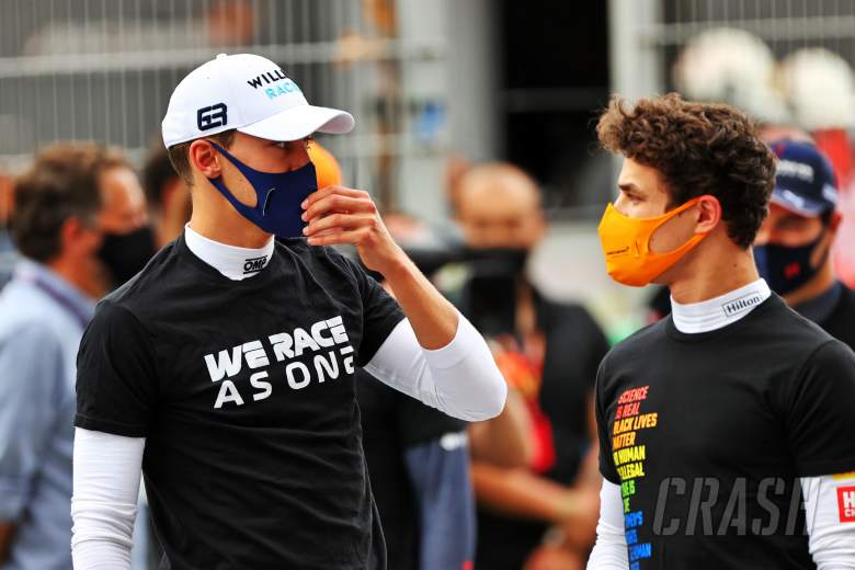 (L to R): George Russell (GBR) Williams Racing with Lando Norris (GBR) McLaren on the grid.