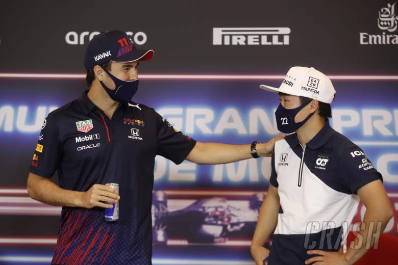 (L to R): Sergio Perez (MEX) Red Bull Racing and Yuki Tsunoda (JPN) AlphaTauri in the FIA Press Conference.