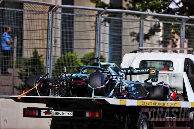The Aston Martin F1 Team AMR21 of Lance Stroll (CDN) Aston Martin F1 Team is recovered back to the pits on the back of a truck after he crashed out of the race.