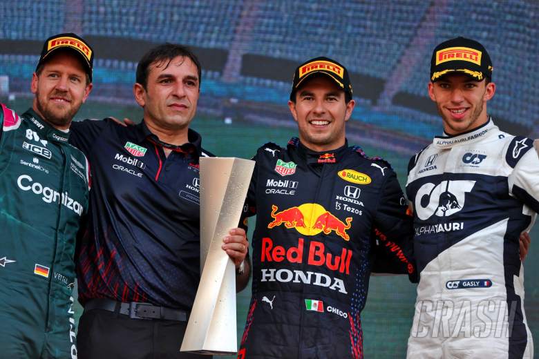 The podium (L to R): Sebastian Vettel (GER) Aston Martin F1 Team; second; Pierre Wache (FRA) Red Bull Racing Technical Director; Sergio Perez (MEX) Red Bull Racing, race winner; Pierre Gasly (FRA) AlphaTauri, third.
