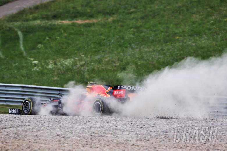 Sergio Perez (MEX) Red Bull Racing RB16B runs wide.
