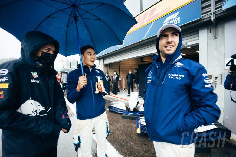 (L to R): Alexander Albon (THA) Red Bull Racing Reserve and Development Driver; George Russell (GBR) Williams Racing; and Nicholas Latifi (CDN) Williams Racing, in the pits while the race is stopped.