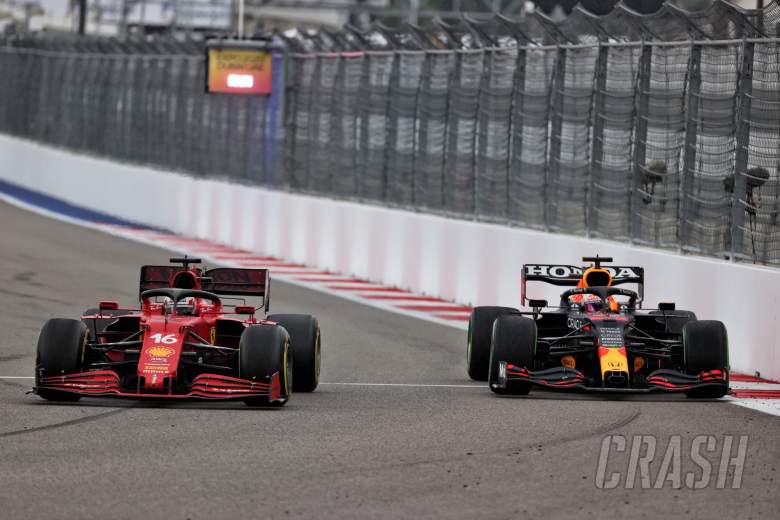 Charles Leclerc (MON) Ferrari SF-21 and Max Verstappen (NLD) Red Bull Racing RB16B battle for position.