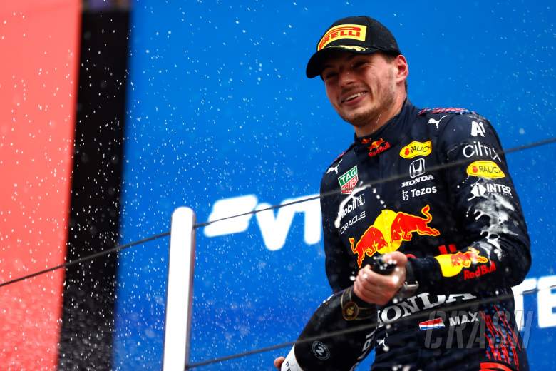 Max Verstappen (NLD) Red Bull Racing celebrates his second position on the podium.