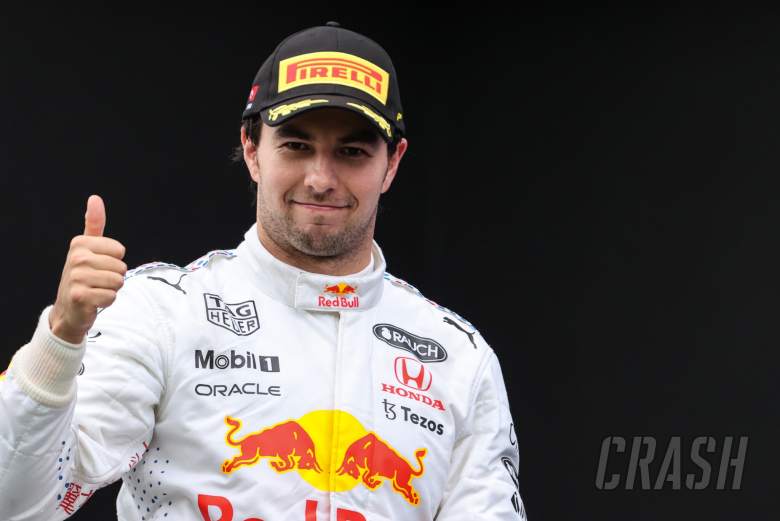 Sergio Perez (MEX) Red Bull Racing celebrates his third position on the podium.