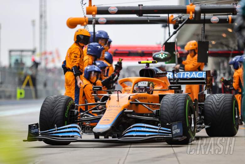 Lando Norris (GBR) McLaren MCL35M makes a pit stop.