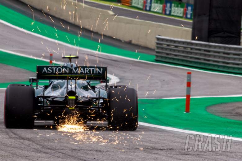 Sebastian Vettel (GER) Aston Martin F1 Team AMR21 sends sparks flying.