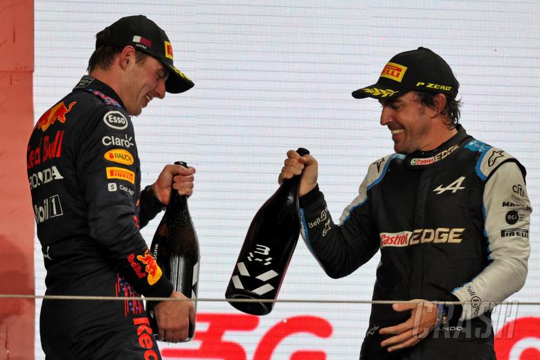 (L to R): Max Verstappen (NLD) Red Bull Racing celebrates his second position with third placed Fernando Alonso (ESP) Alpine F1 Team on the podium.