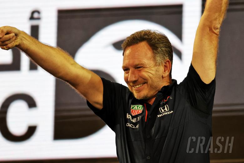 Christian Horner (GBR) Red Bull Racing Team Principal celebrates on the podium.