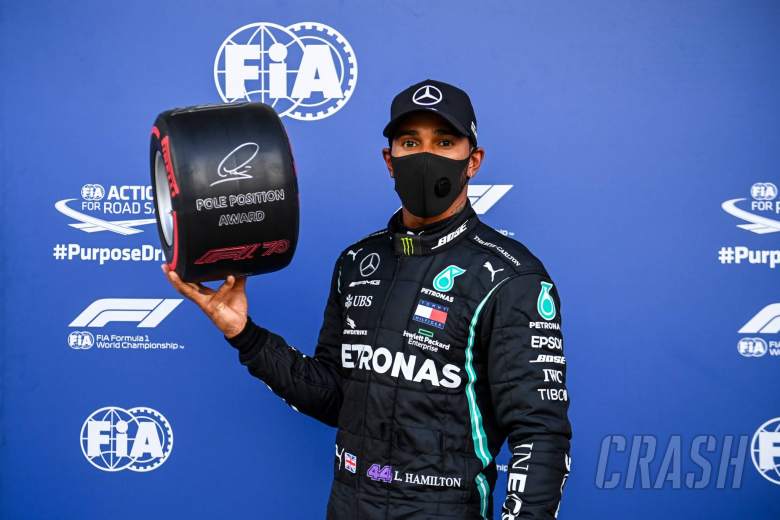 Lewis Hamilton (GBR) Mercedes AMG F1 celebrates with the Pirelli Pole Position Award in qualifying parc ferme.