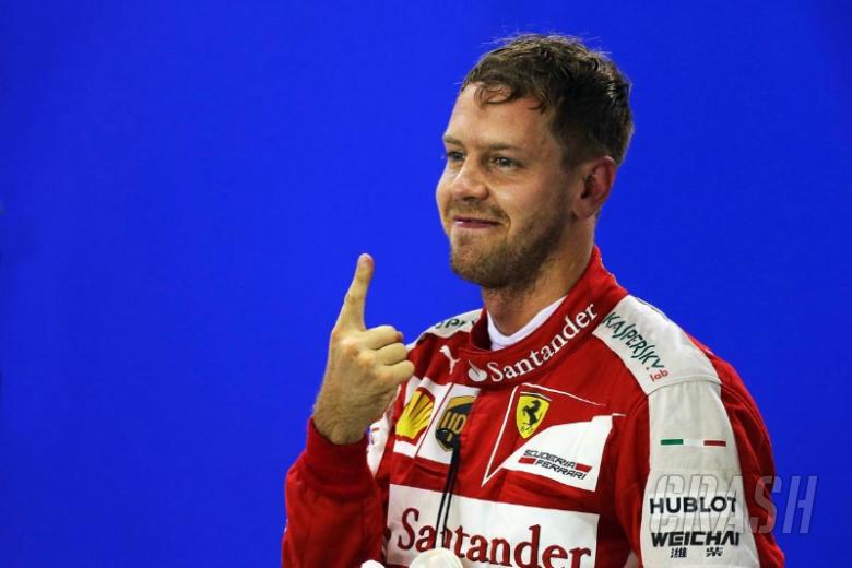 Vettel hails first Ferrari F1 pole since 2012
