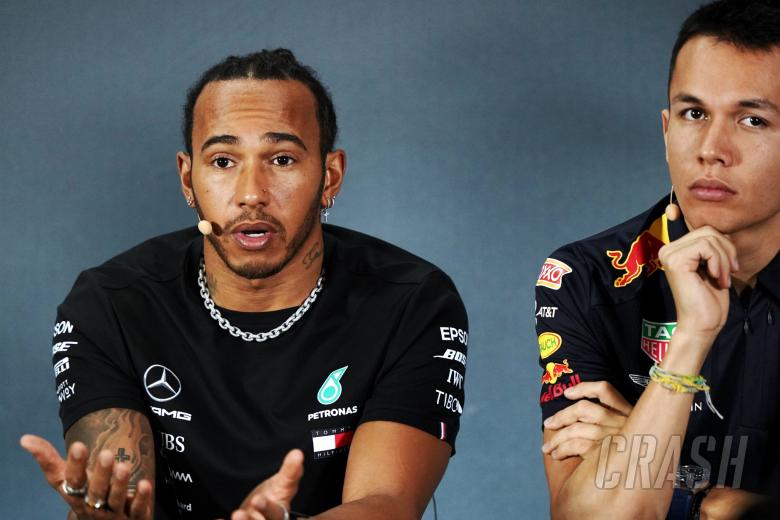 (L to R): Lewis Hamilton (GBR) Mercedes AMG F1 with Alexander Albon (THA) Red Bull Racing in the FIA Press