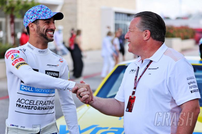 (L to R): Daniel Ricciardo (AUS) McLaren with Zak Brown (USA) McLaren Executive