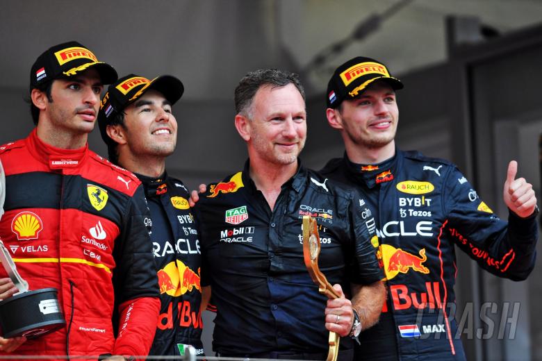 The podium (L to R): Carlos Sainz Jr (ESP) Ferrari, second; Sergio Perez (MEX) Red Bull Racing, race winner; Christian