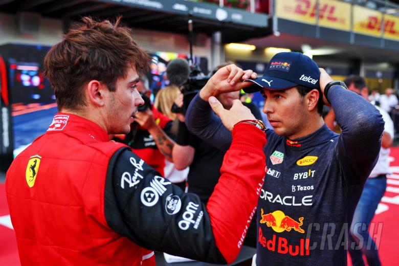 (L to R): Pole sitter Charles Leclerc (MON) Ferrari in qualifying parc ferme with second placed Sergio Perez (MEX) Red Bull