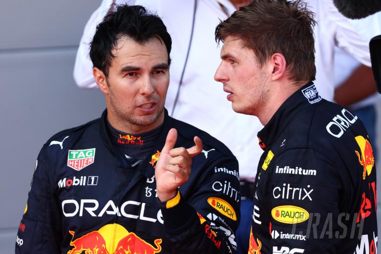 Sergio Perez (MEX) Red Bull Racing RB18 and Max Verstappen (NLD) Red Bull Racing RB18. Formula 1 World Championship, Rd 8,
