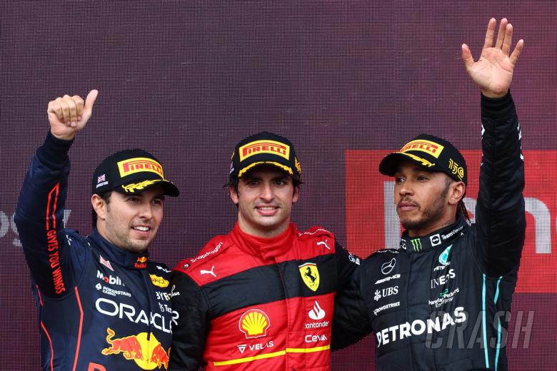 1st place Carlos Sainz Jr (ESP) Ferrari F1-75, with 2nd place Sergio Perez (MEX) Red Bull Racing RB18 and 3rd place Lewis