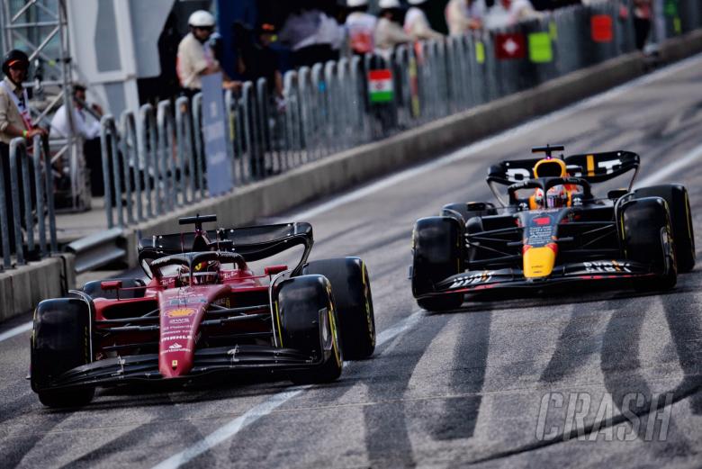 Charles Leclerc (MON) Ferrari F1-75 and Max Verstappen (NLD) Red Bull Racing RB18. Formula 1 World Championship, Rd 19,