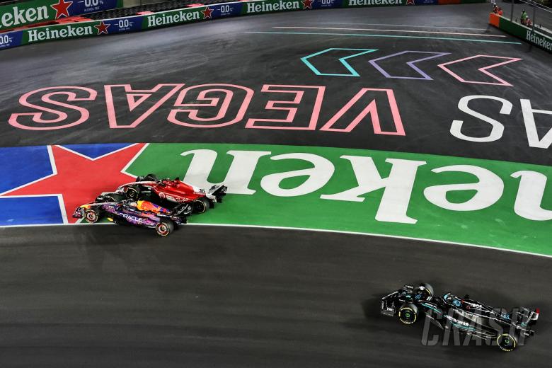 Max Verstappen (NLD) Red Bull Racing RB19 and Charles Leclerc (MON) Ferrari SF-23 battle for the lead at the start of the