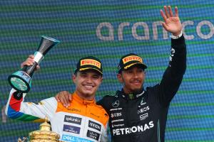 Lando Norris (GBR) McLaren and Lewis Hamilton (GBR) Mercedes AMG F1. Formula 1 World Championship, Rd 11, British Grand
