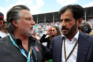 (L to R): Michael Andretti (USA) with