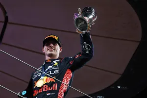 Race winner Max Verstappen (NLD) Red Bull Racing celebrates on the podium. Formula 1 World Championship, Rd 23, Abu Dhabi