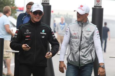 Nico Rosberg pictured in 2012 alongside Mercedes teammate Michael Schumacher.