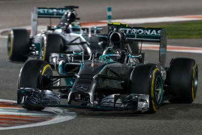 Nico Rosberg and Lewis Hamilton on track at the 2014 Abu Dhabi Grand Prix.